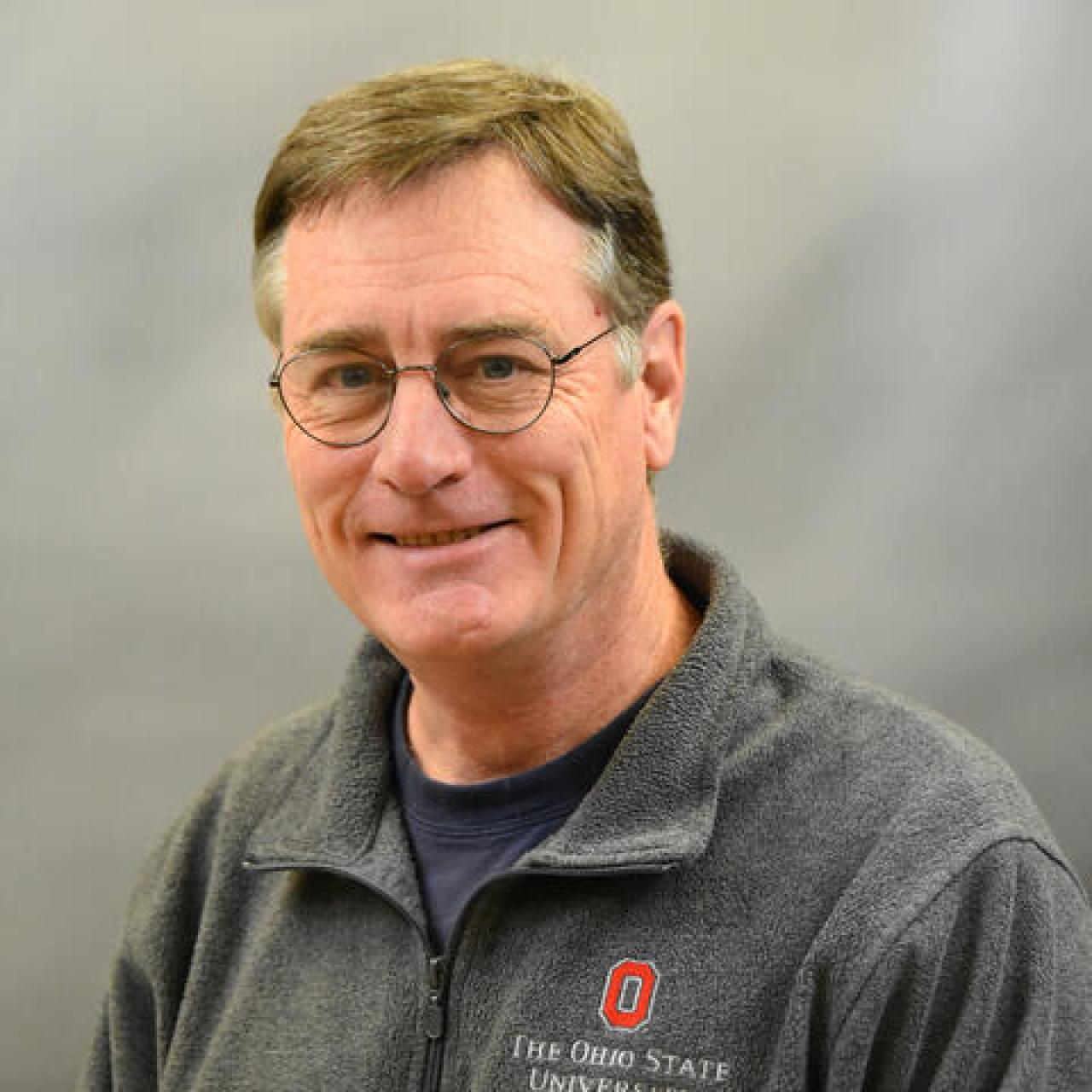 John M Horack smiling and wearing an ohio state shirt