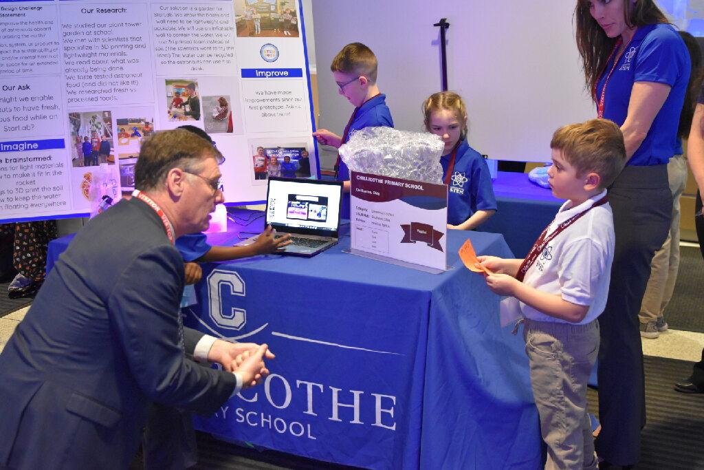 Ohio State administrator listening to student